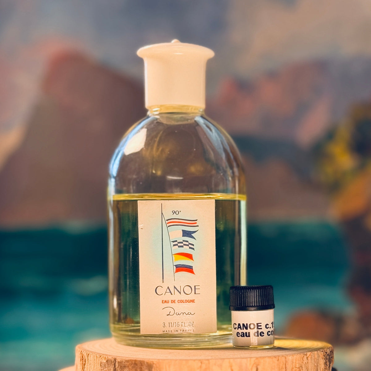 Large vintage bottle of vintage Canoe eau de cologne and small bottle of the decant c.1959-1970